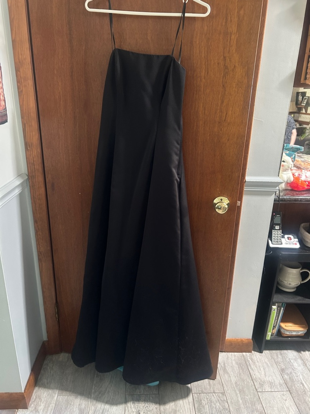 Black A-Line prom dress with beaded flower details in the back